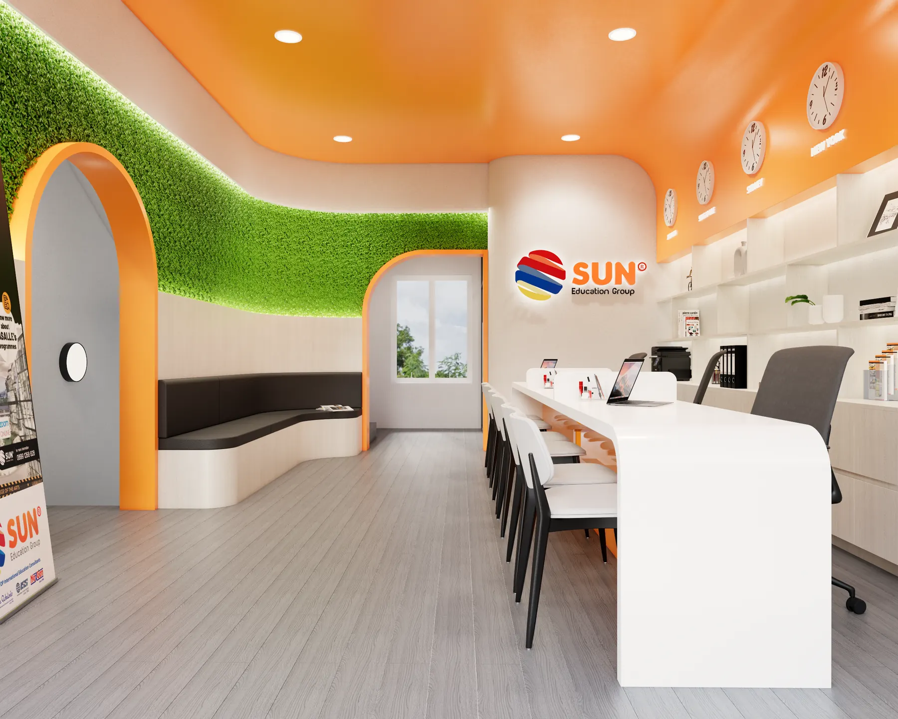 Reception with a curved green wall, orange ceiling and a long white counter