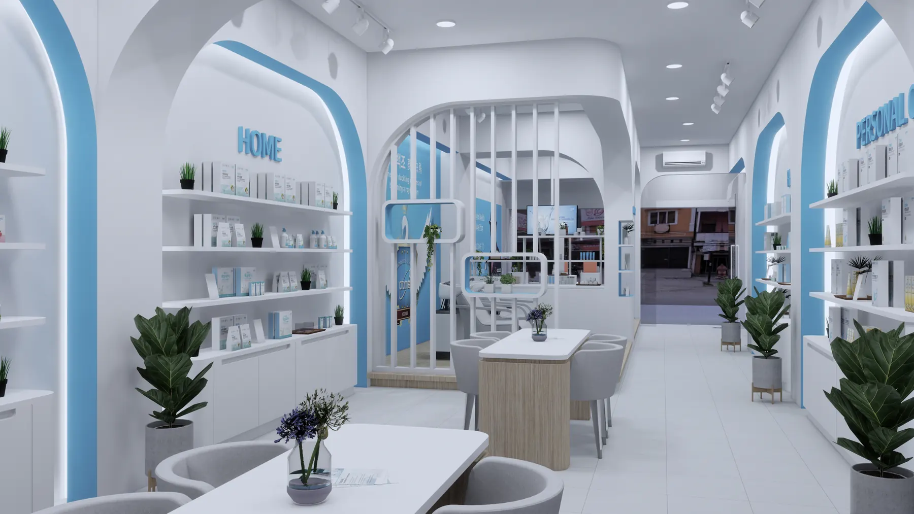 View down the store past shelving and a seating table to the entrance
