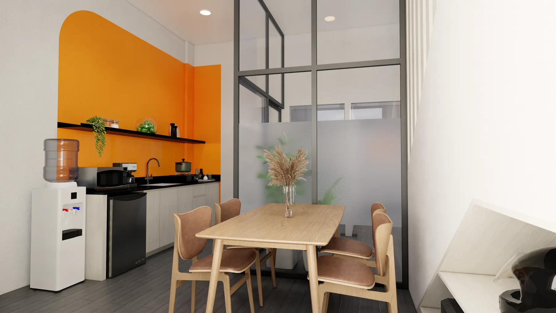 Staff pantry with an orange wall and a timber table