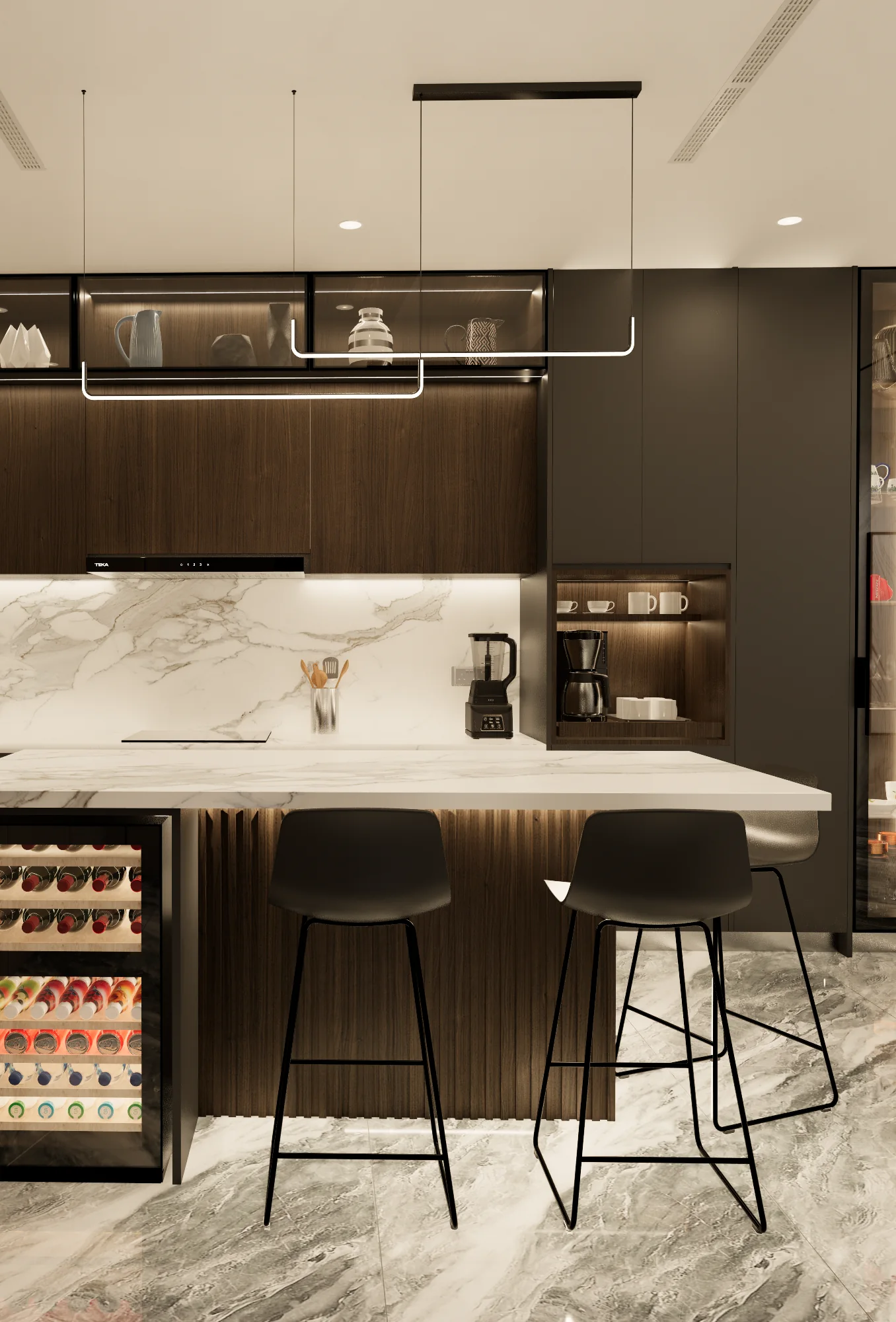 The kitchen in the Jaia showroom: dark timber cabinets, a lit marble splashback and a marble island with bar stools under a slim pendant light